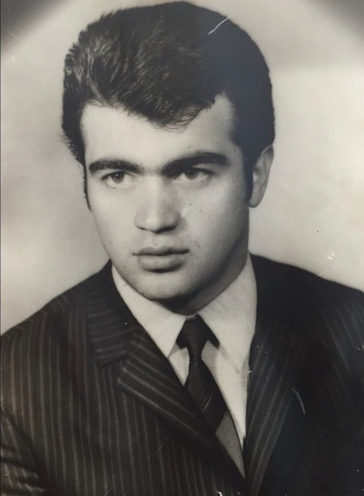 Our late father, Baba, as a young man in a suit