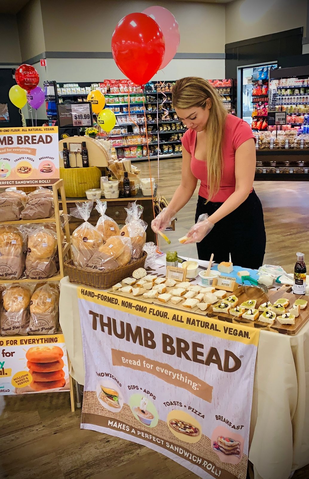 Arzu Esendemir serving samples at a Thumb Bread® in-store tasting demo at ShopRite