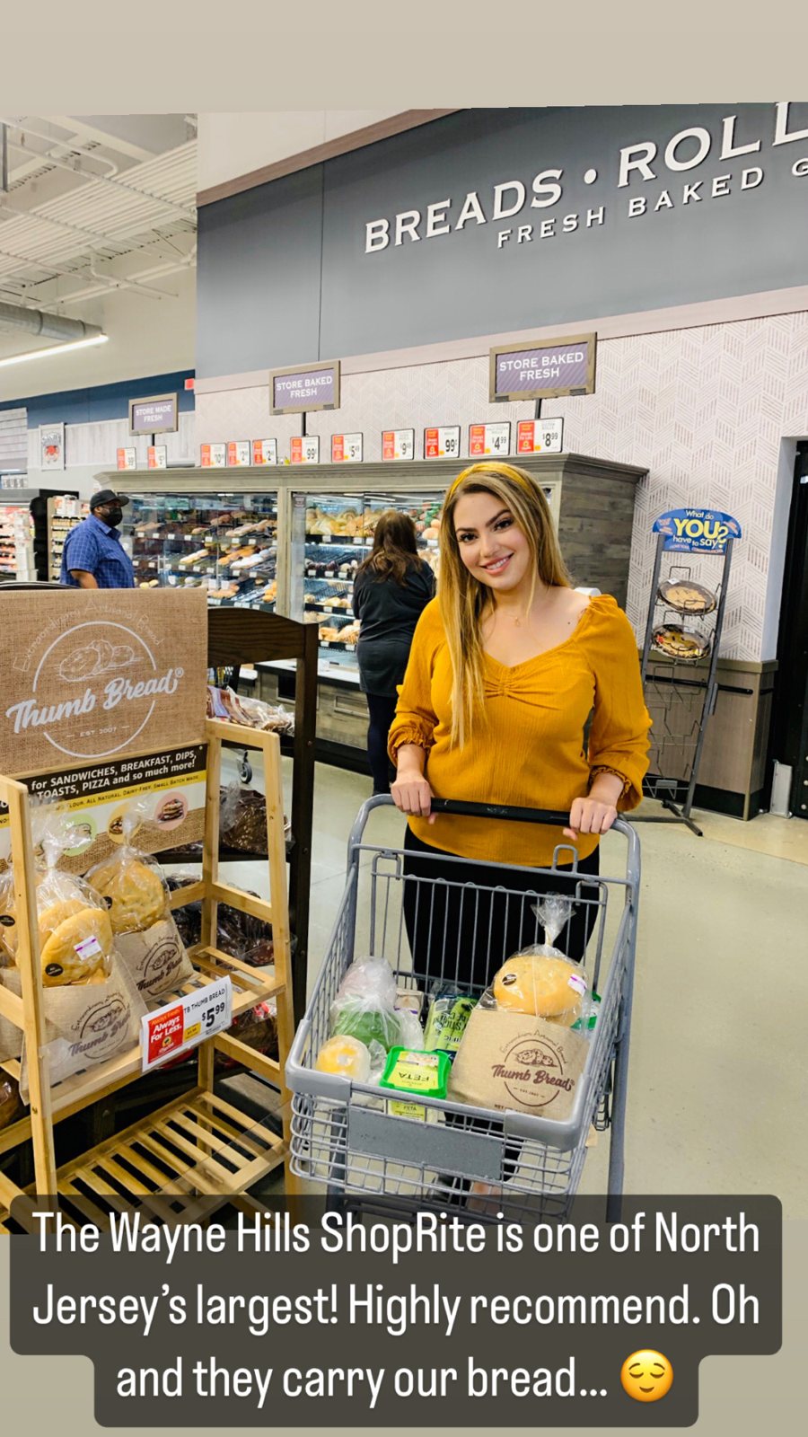 Arzu Esendemir with Thumb Bread® in her shopping cart next to a Thumb Bread® display at the Wayne Hills ShopRite in Wayne, NJ