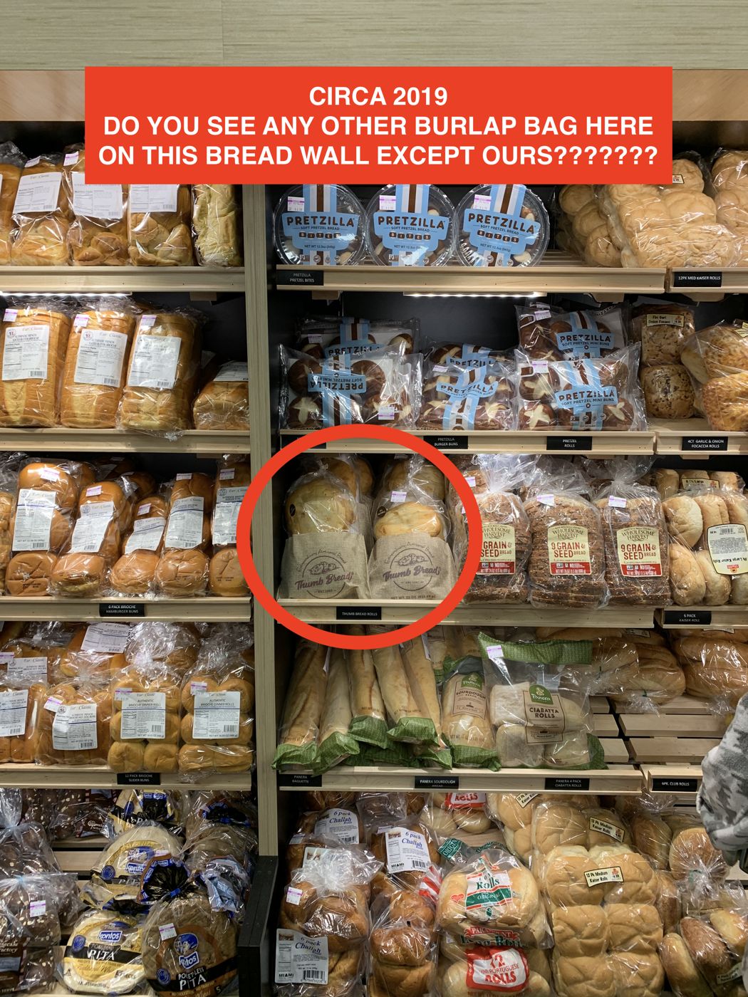Thumb Bread® in burlap bags on a grocery store bread wall