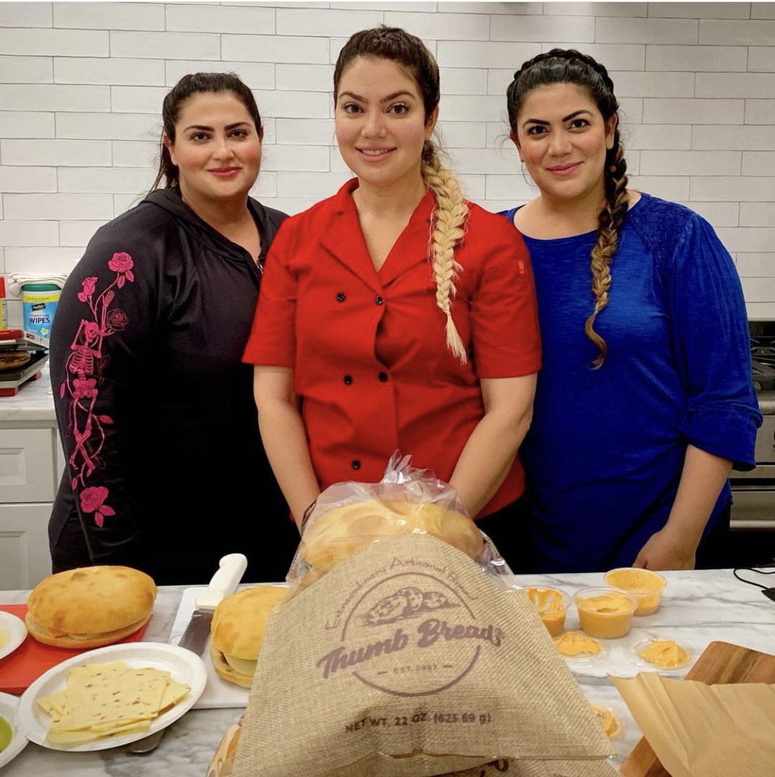 The three Esendemir sisters with Thumb Bread® in a test kitchen