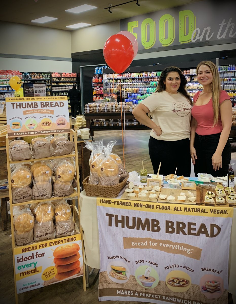 The Esendemir sisters at a Thumb Bread® in-store tasting table